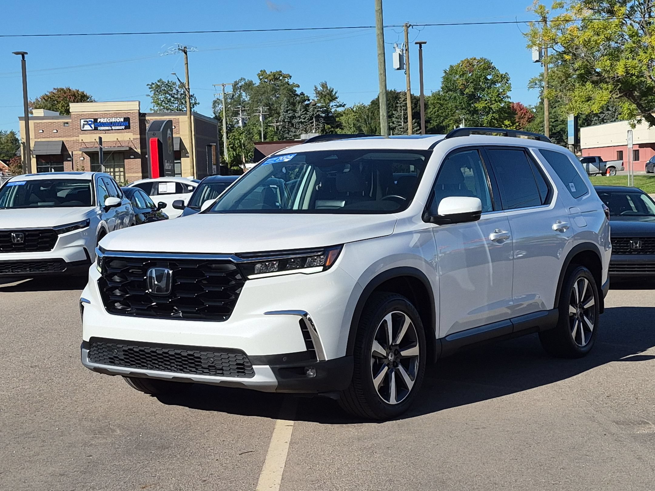 Certified 2024 Honda Pilot Touring image 1