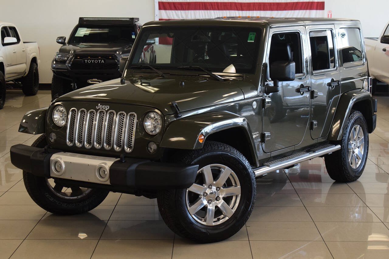 Used 2015 Jeep Wrangler Unlimited Sahara w/ Dual Top Group AWD/4WD image 15