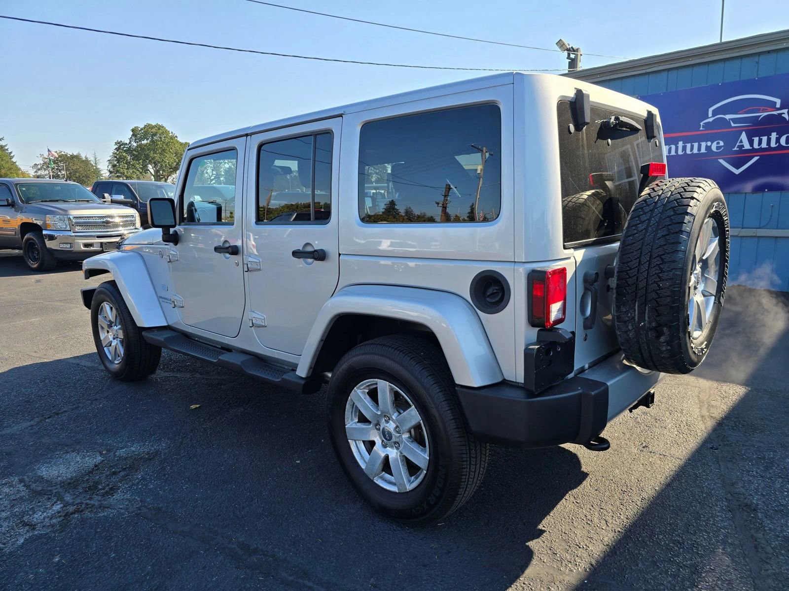 Used 2011 Jeep Wrangler Unlimited 70th Anniversary w/ Dual Top Group image 3