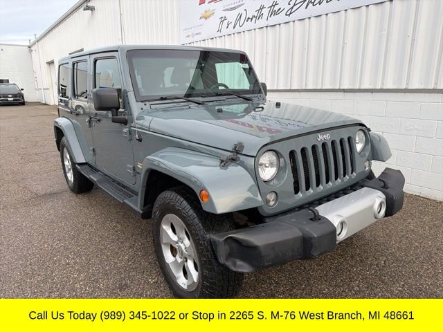 Used 2014 Jeep Wrangler Unlimited Sahara w/ Dual Top Group AWD/4WD image 2