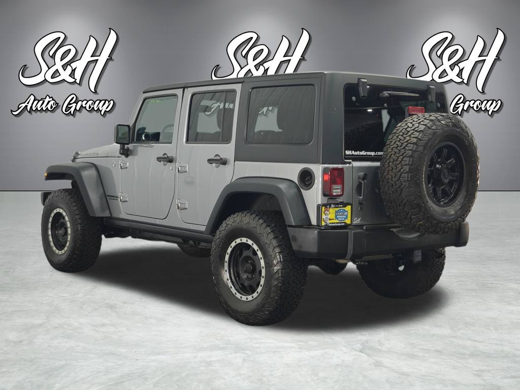 Used 2013 Jeep Wrangler Unlimited Rubicon w/ Dual Top Group AWD/4WD image 17
