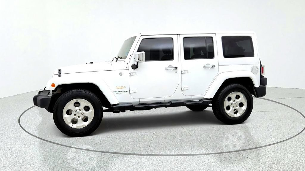 Used 2015 Jeep Wrangler Unlimited Sahara w/ Dual Top Group AWD/4WD image 8
