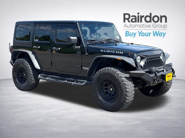 Used 2014 Jeep Wrangler Unlimited Rubicon w/ Connectivity Group AWD/4WD image 1