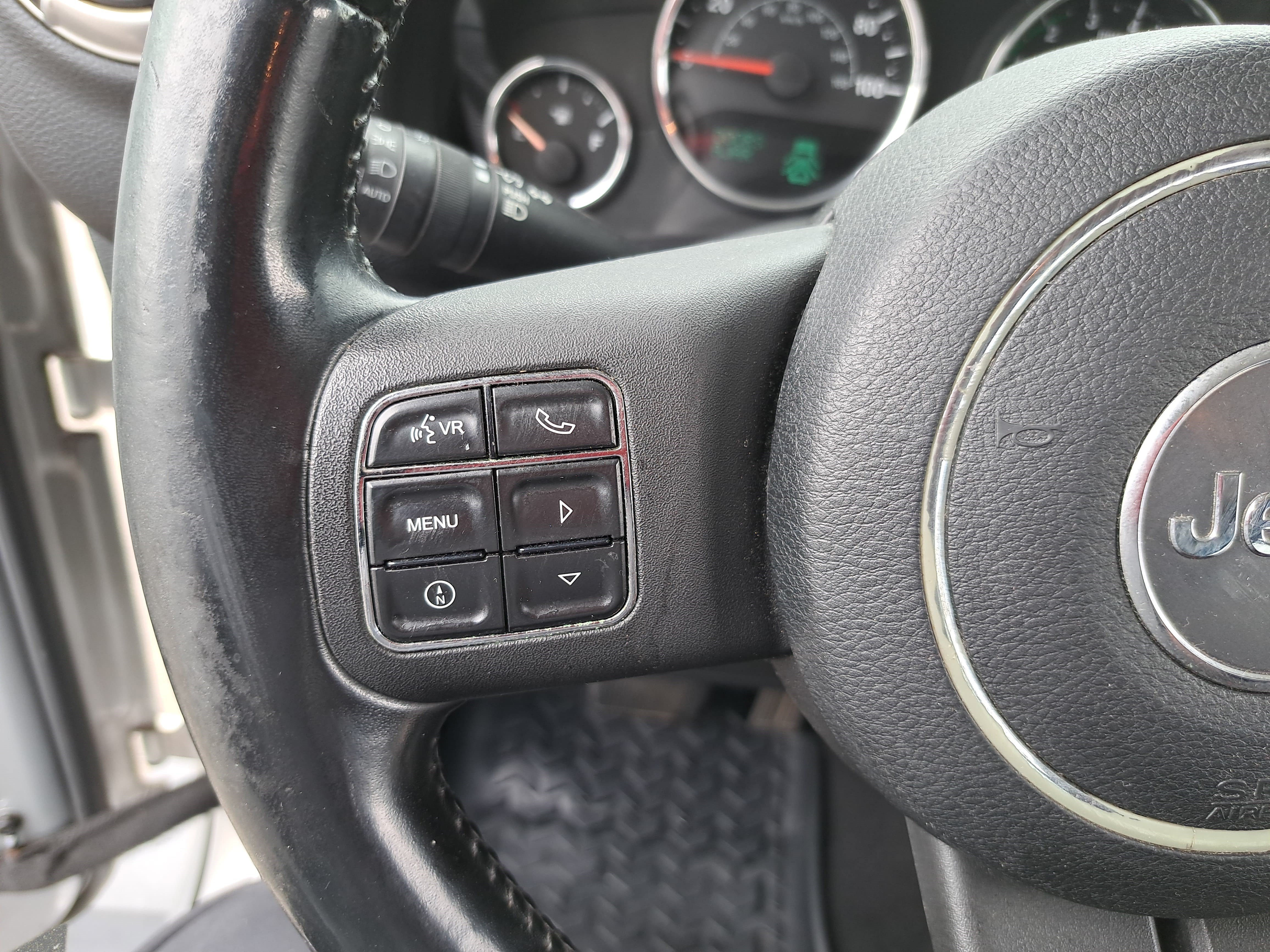 Used 2012 Jeep Wrangler Unlimited Sahara w/ Dual Top Group AWD/4WD image 16