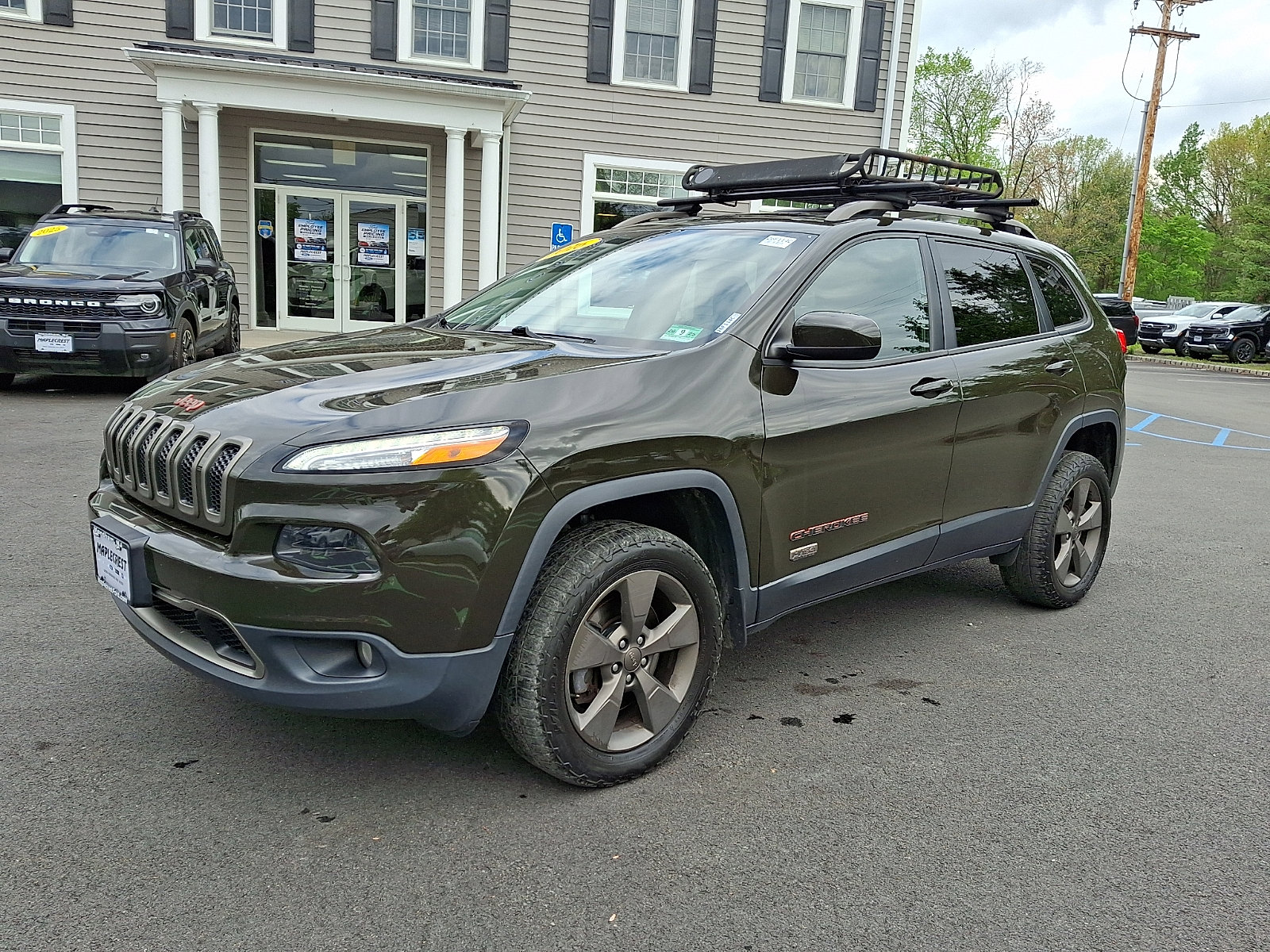 Used 2016 Jeep Cherokee 75th Anniversary AWD/4WD image 1
