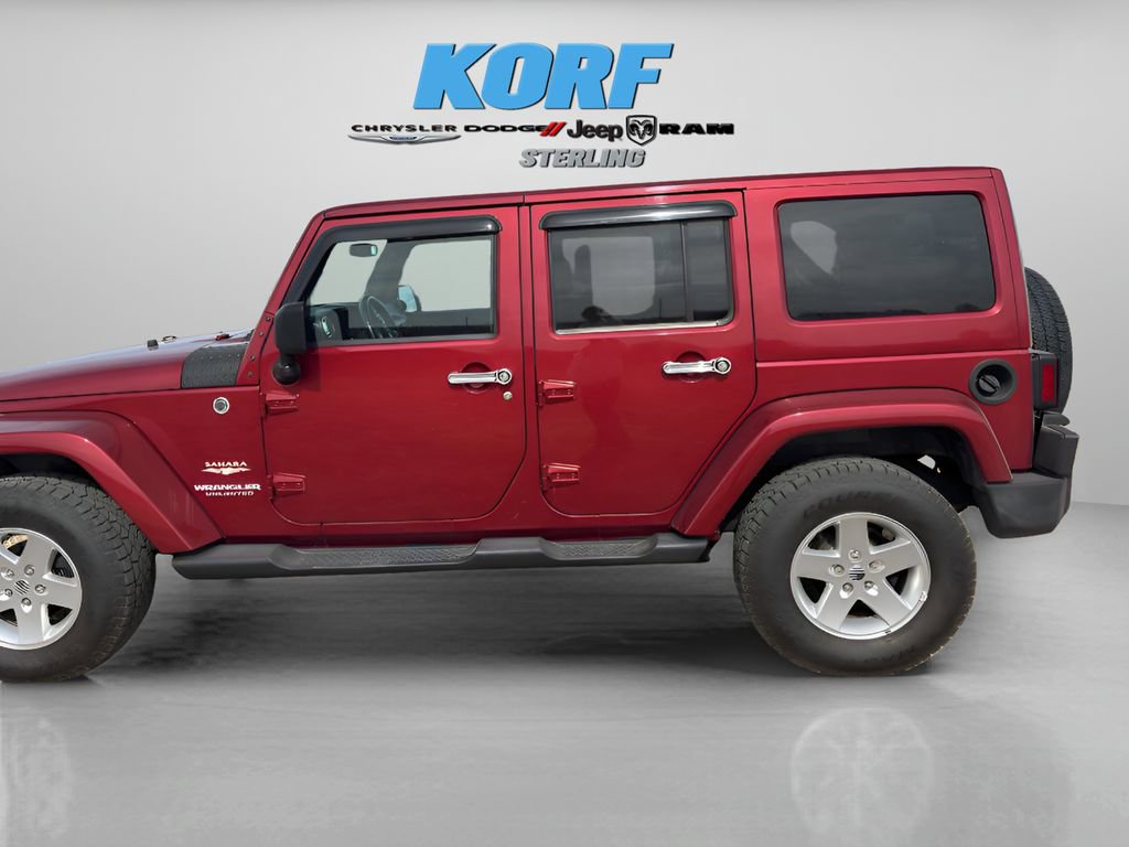 Used 2012 Jeep Wrangler Unlimited Sahara w/ Dual Top Group image 7
