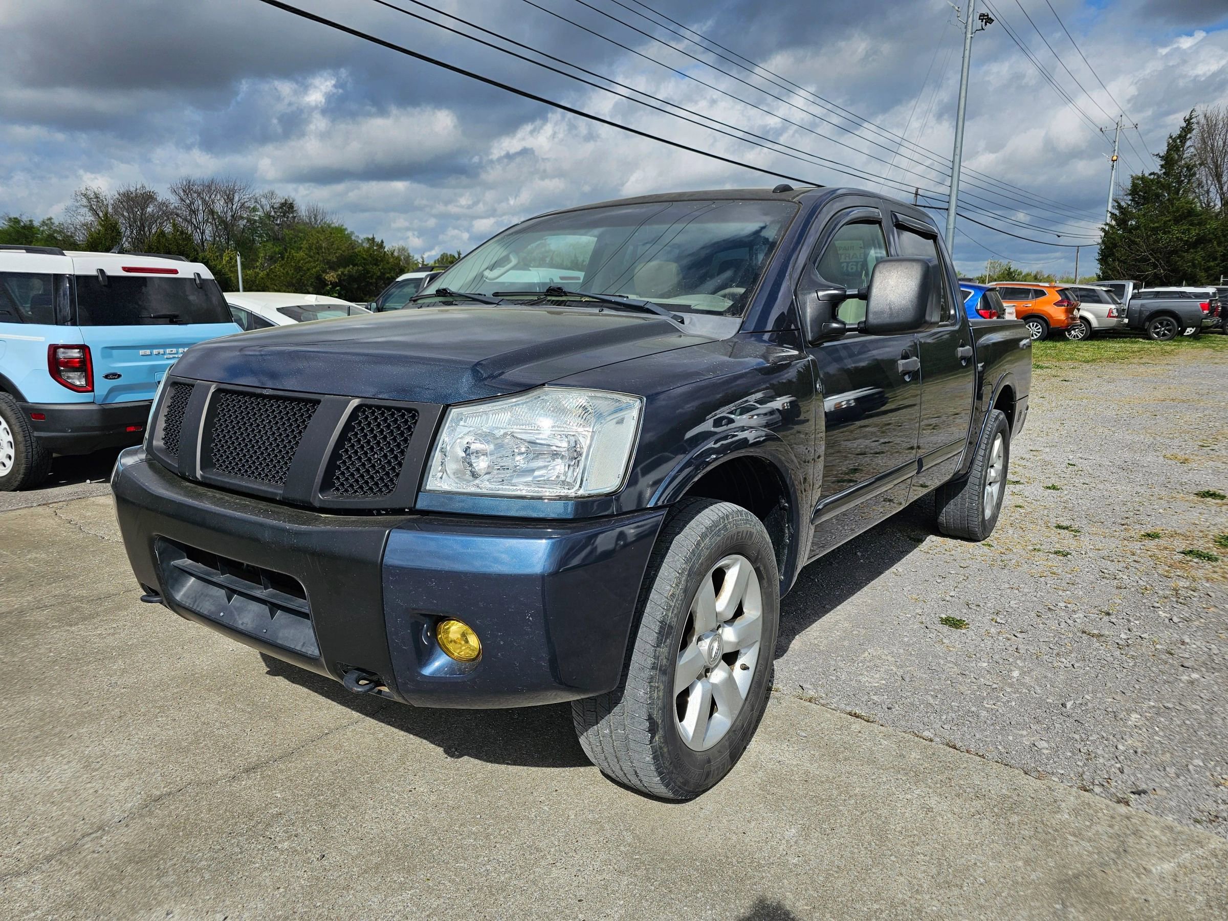 Used 2015 Nissan Titan SL w/ SL Moonroof Package image 1