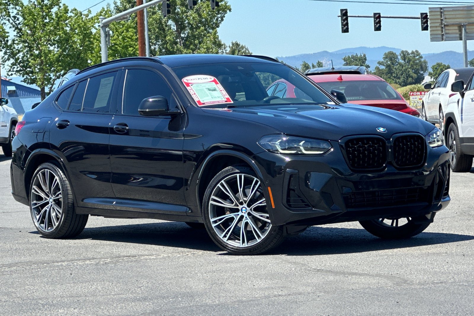 Used 2023 BMW X4 xDrive30i w/ M Sport Package AWD/4WD image 2