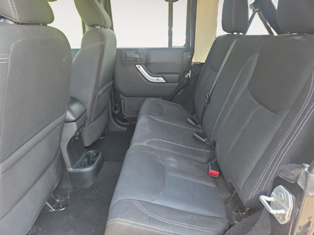 Used 2016 Jeep Wrangler Unlimited Sahara w/ Dual Top Group AWD/4WD image 14