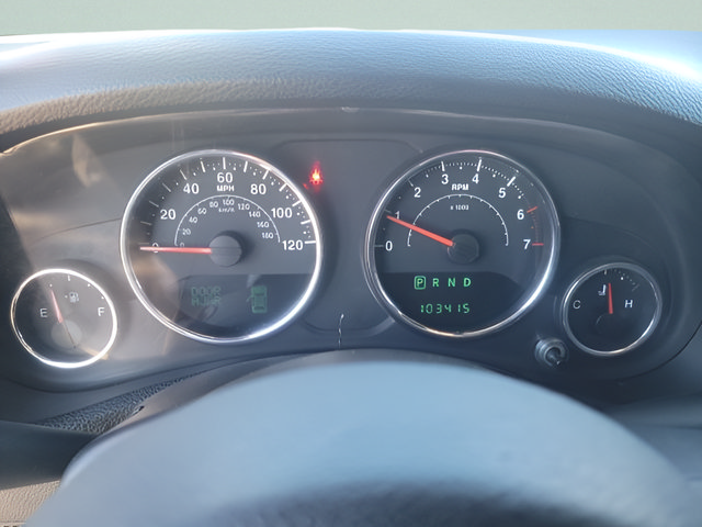 Used 2012 Jeep Wrangler Unlimited Sahara w/ Dual Top Group AWD/4WD image 12