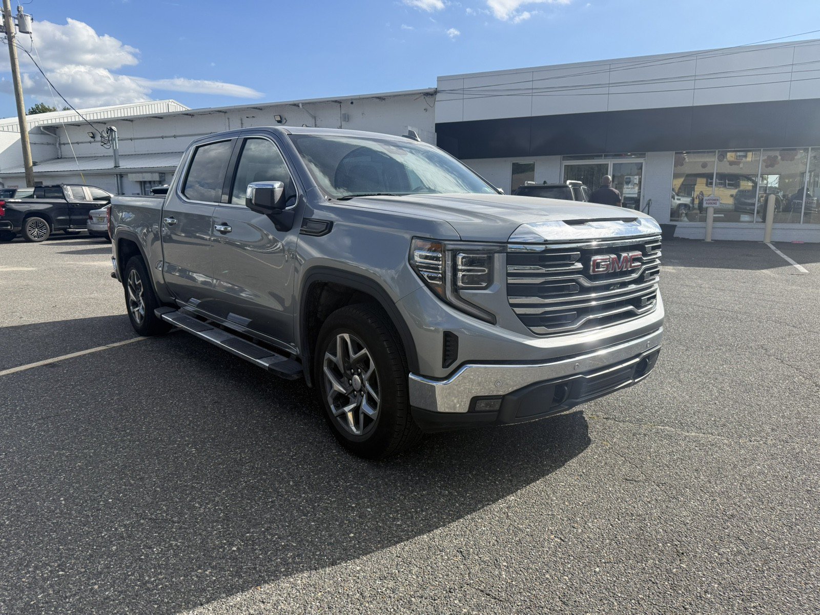 Used 2024 GMC Sierra 1500 SLT w/ SLT Premium Plus Package AWD/4WD image 1