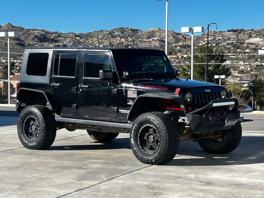 Used 2009 Jeep Wrangler Unlimited Rubicon w/ Dual Top Group image 2