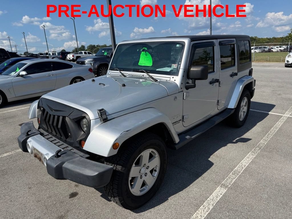 Used 2011 Jeep Wrangler Unlimited Sahara w/ Connectivity Group AWD/4WD image 2