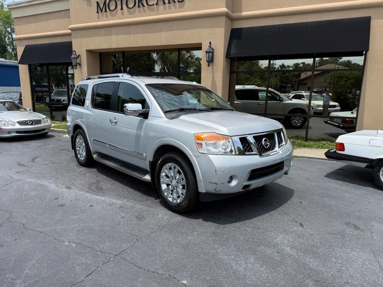 Used 2015 Nissan Armada Platinum w/ 2nd Row Captain Seat Package RWD image 1