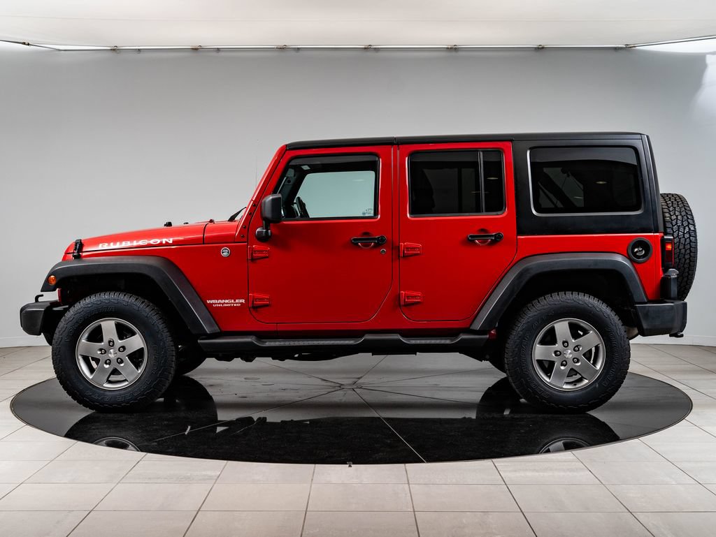 Used 2012 Jeep Wrangler Unlimited Rubicon w/ Dual Top Group AWD/4WD image 5