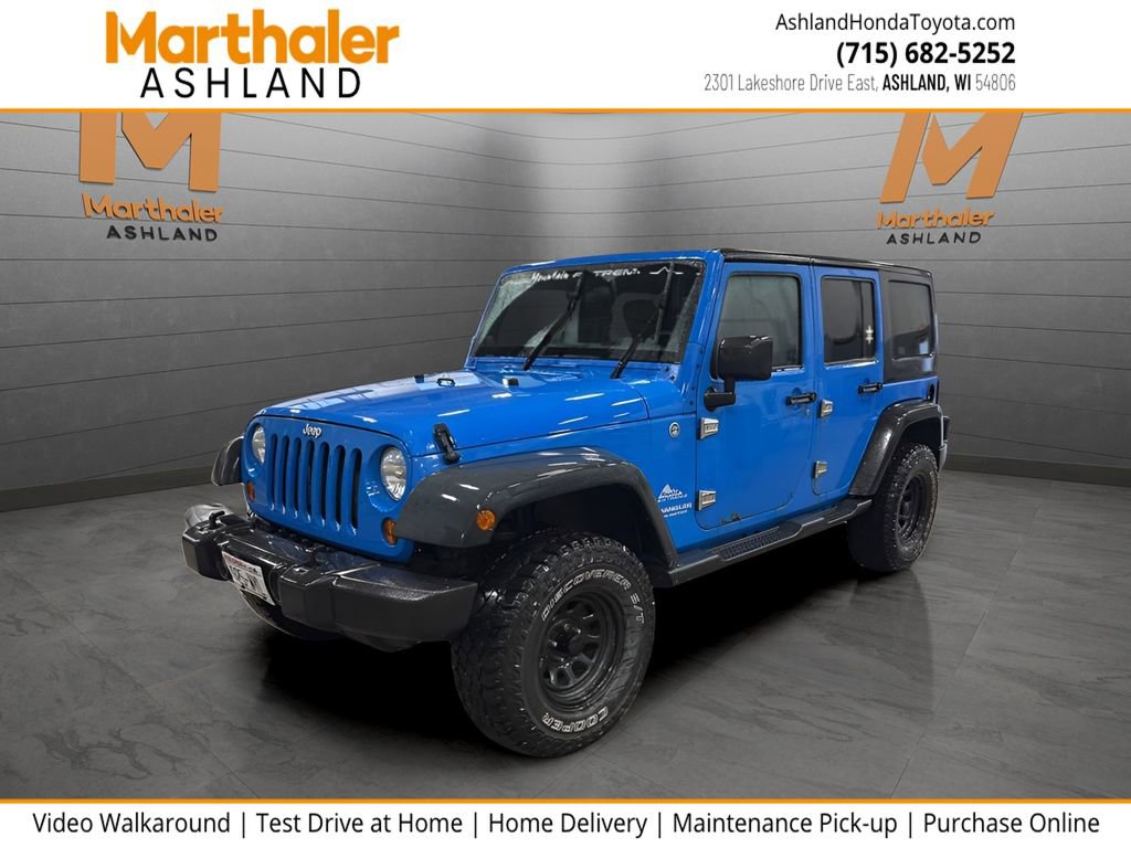 Used 2011 Jeep Wrangler Unlimited Sport w/ Trailer Tow Group AWD/4WD image 1