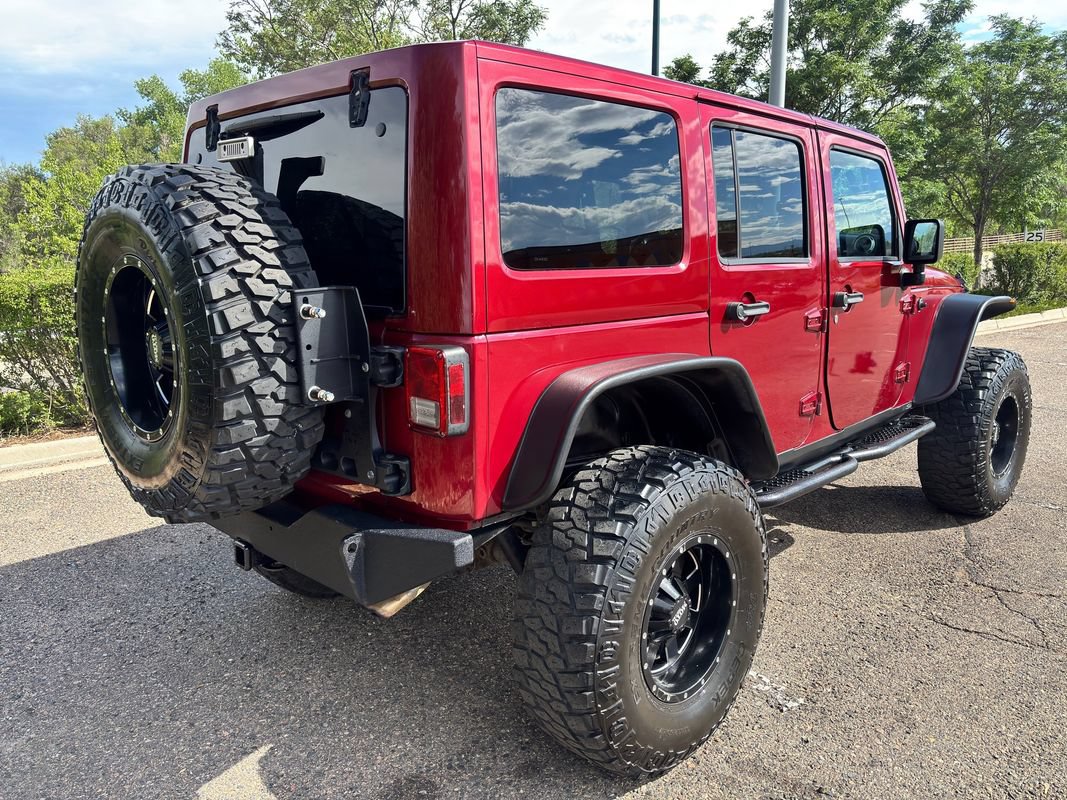 Used 2013 Jeep Wrangler Unlimited Sahara w/ Dual Top Group AWD/4WD image 9