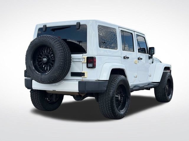 Used 2014 Jeep Wrangler Unlimited Sahara w/ Dual Top Group AWD/4WD image 12