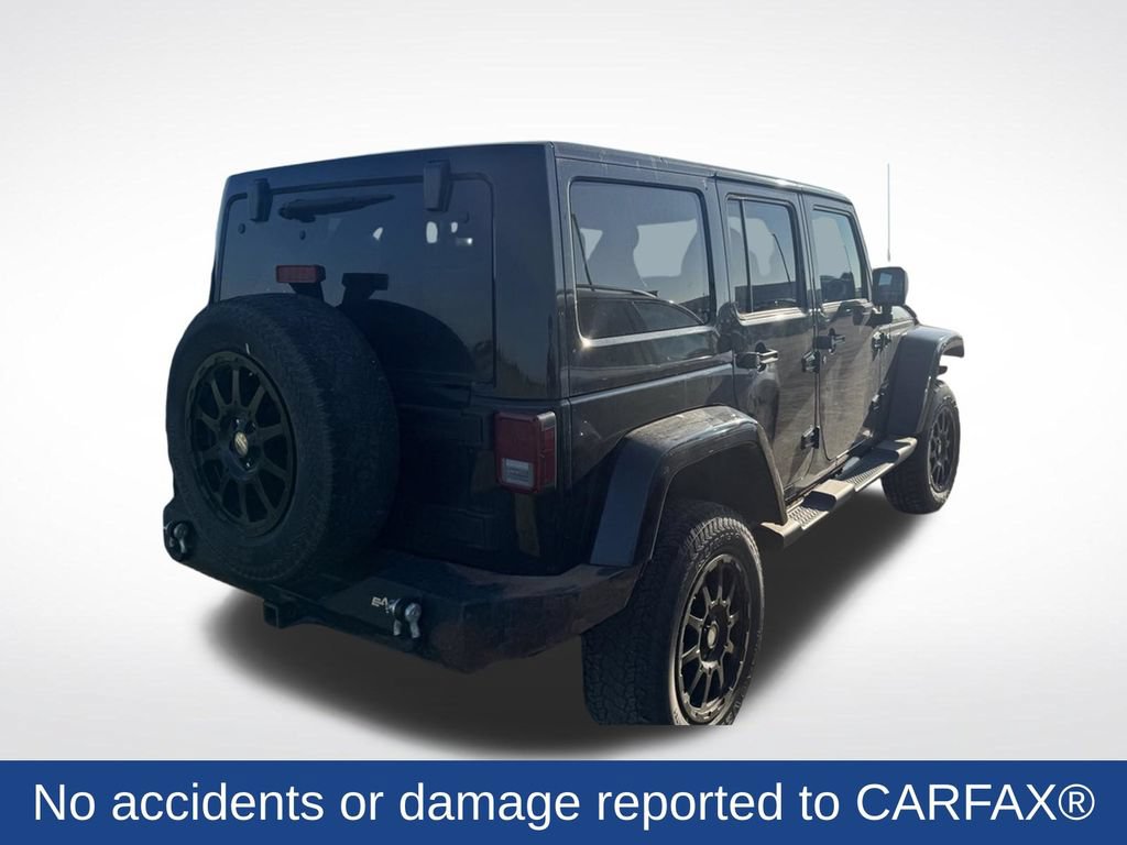 Used 2012 Jeep Wrangler Unlimited Sahara w/ Dual Top Group AWD/4WD video 2