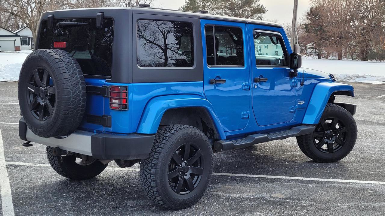 Used 2014 Jeep Wrangler Unlimited Sahara w/ Dual Top Group AWD/4WD image 7