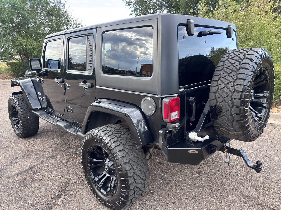 Used 2013 Jeep Wrangler Unlimited Sahara w/ Dual Top Group AWD/4WD image 6