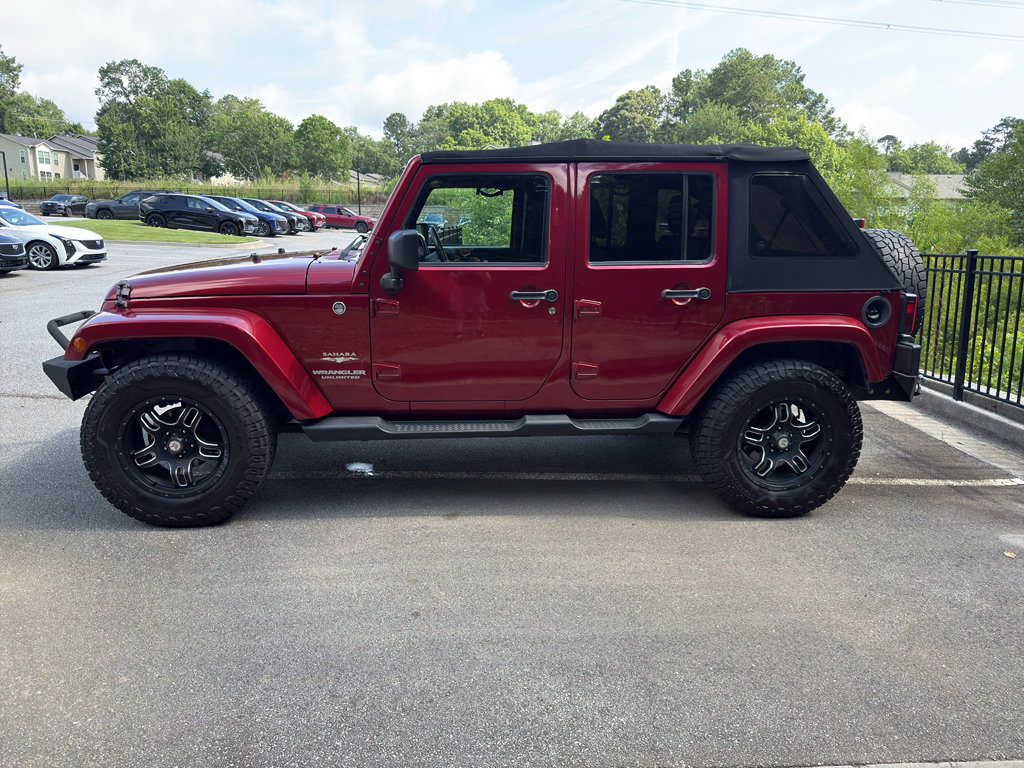 Used 2012 Jeep Wrangler Unlimited Sahara w/ Dual Top Group AWD/4WD image 5