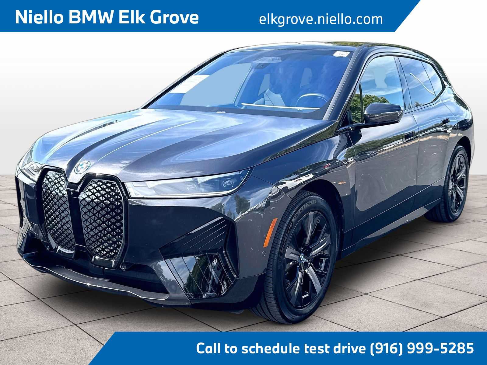 Used 2024 BMW iX xDrive50 w/ Sport Package AWD/4WD image 1