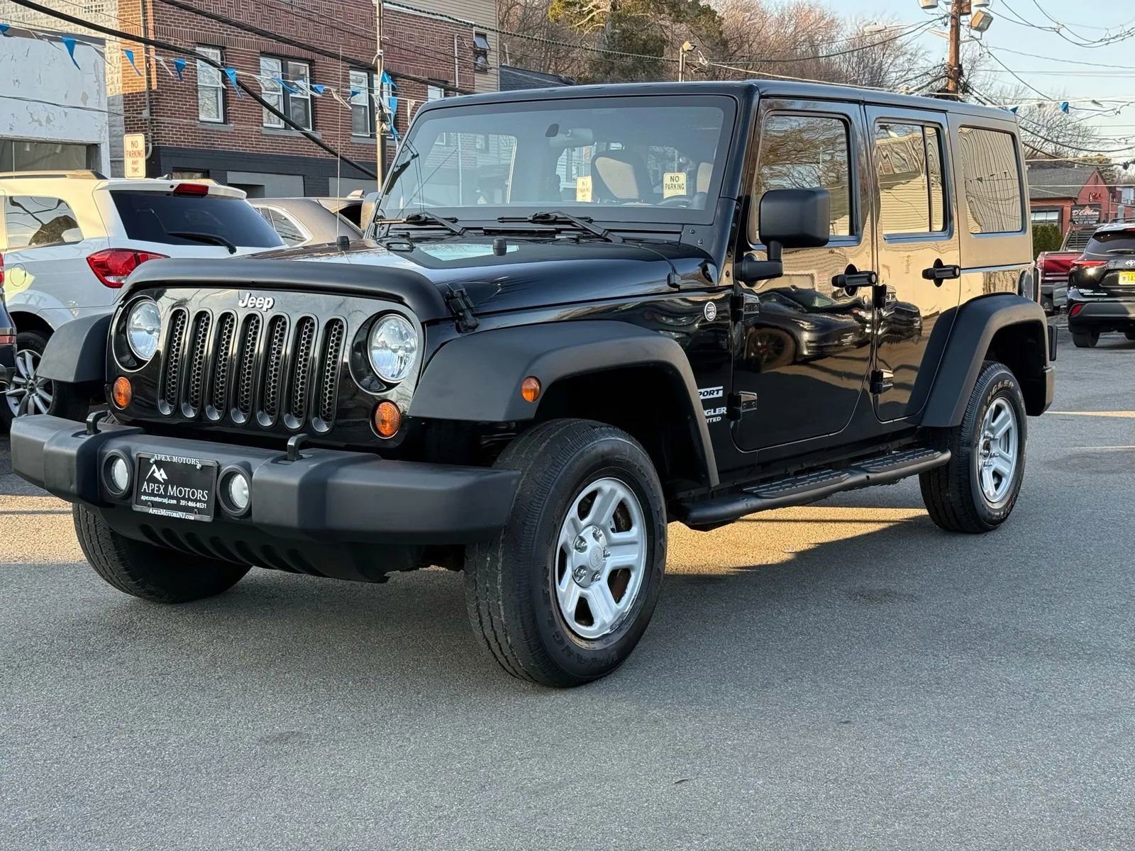 Used 2013 Jeep Wrangler Unlimited Sport image 1