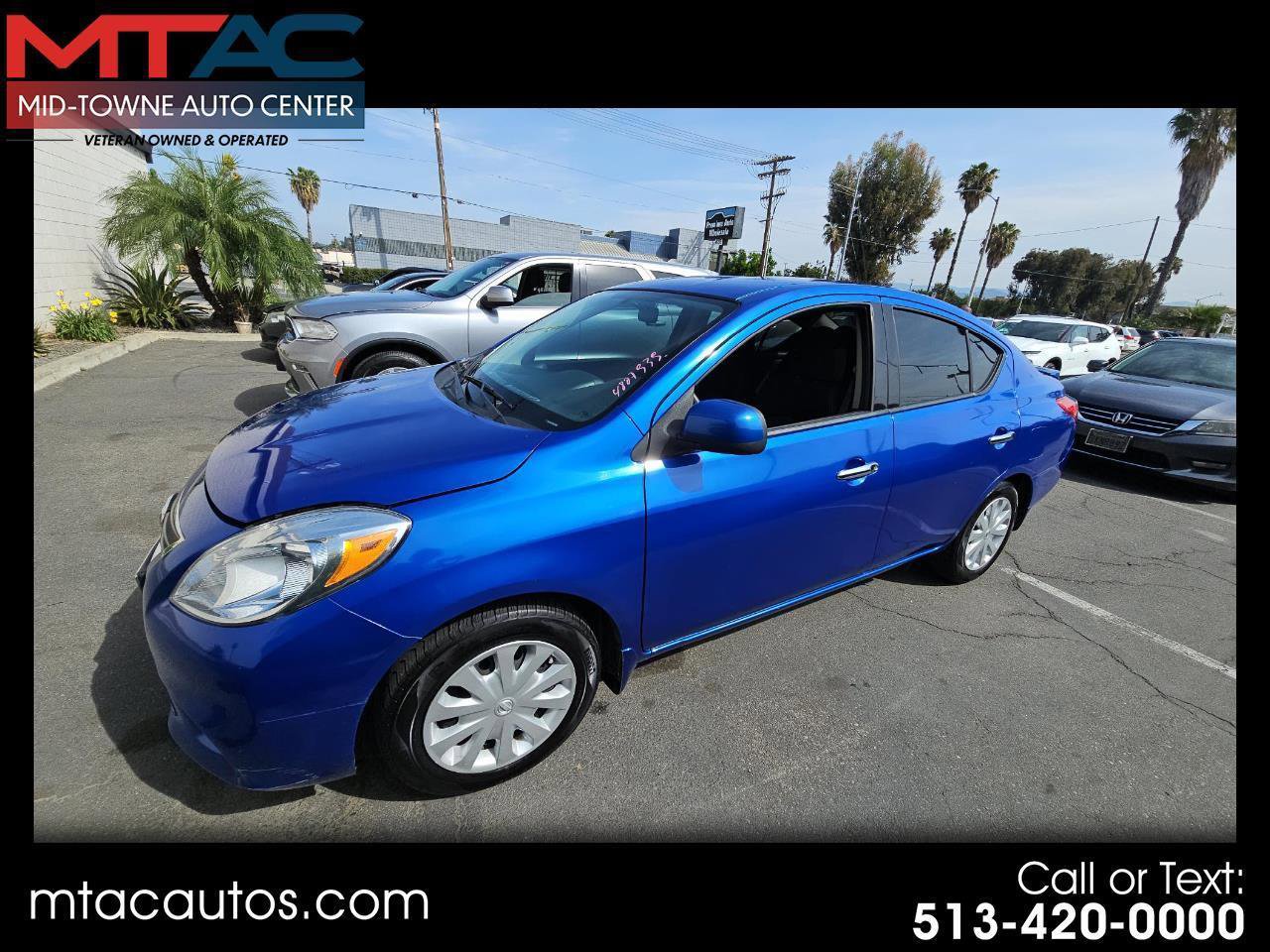 Used 2014 Nissan Versa SV image 1