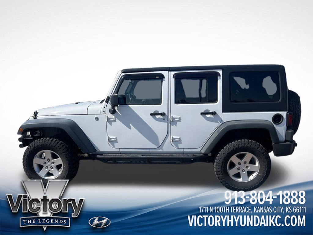 Used 2013 Jeep Wrangler Unlimited Sport AWD/4WD image 2