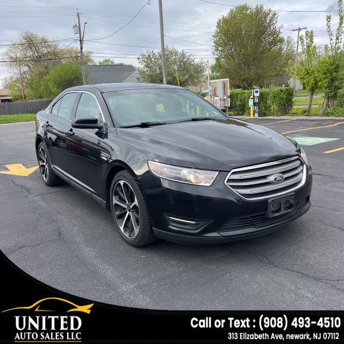 Used 2015 Ford Taurus SEL w/ Equipment Group 201A AWD/4WD image 1