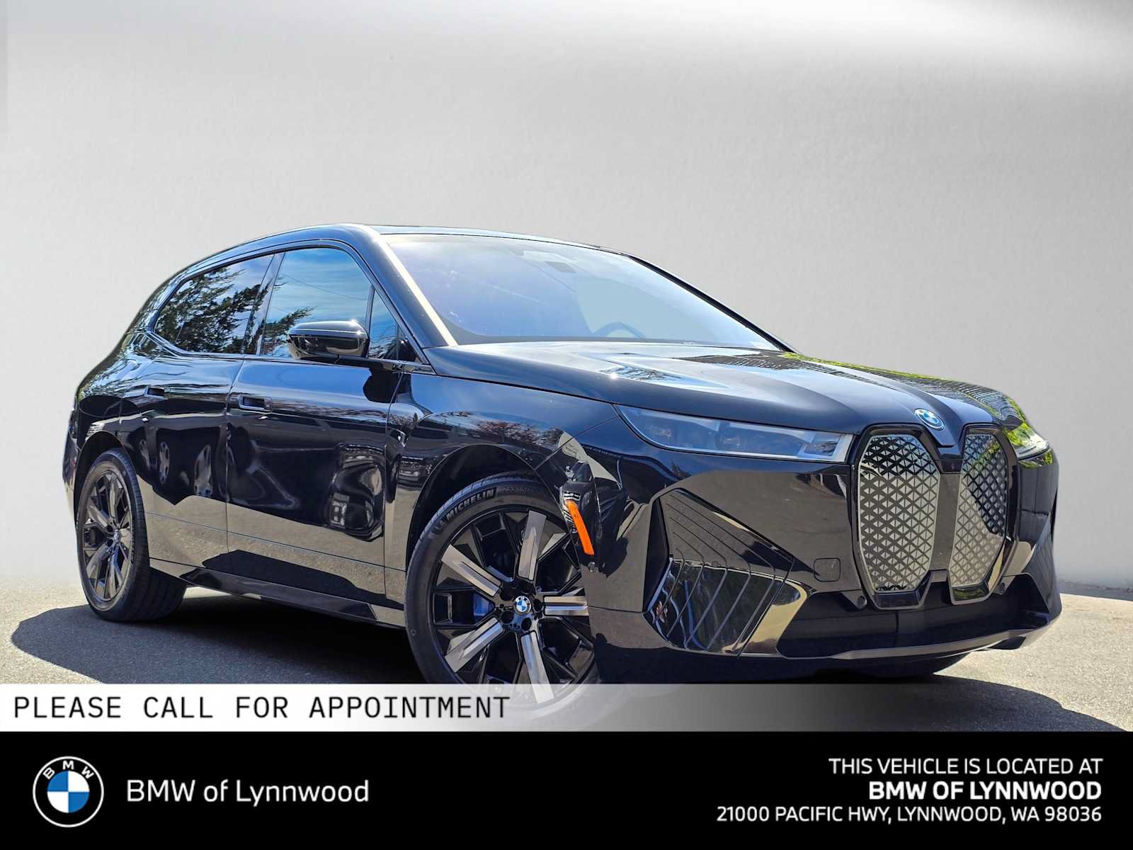 Used 2024 BMW iX xDrive50 w/ Premium Package AWD/4WD image 1