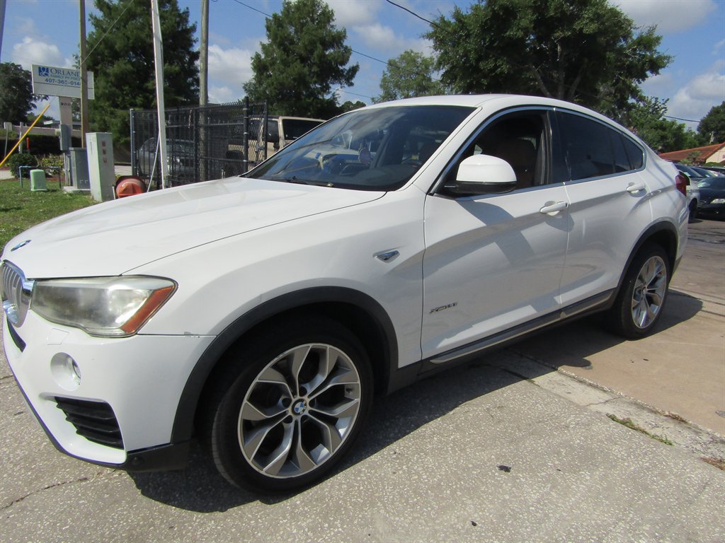 Used 2018 BMW X4 xDrive28i AWD/4WD image 1