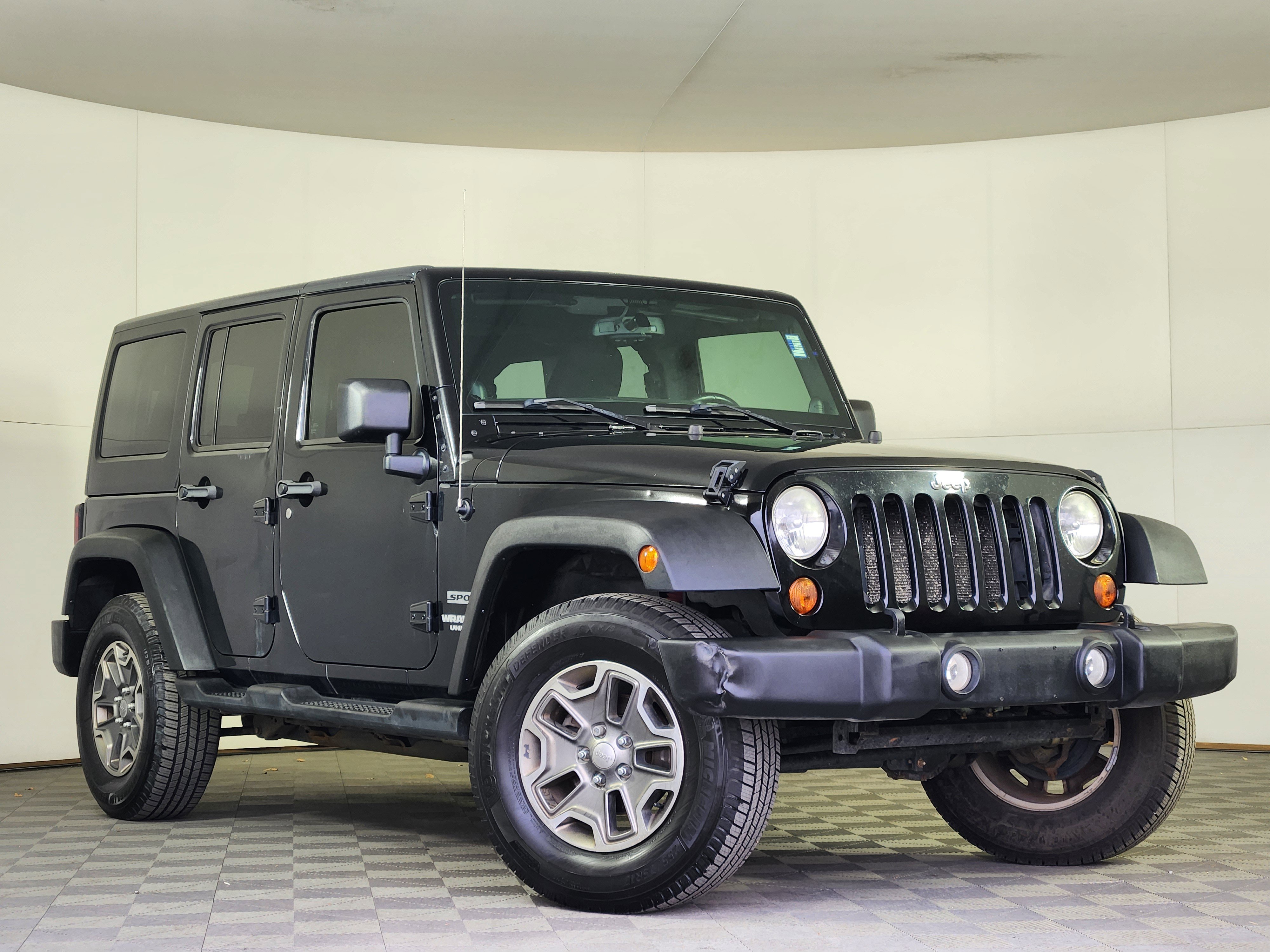 Used 2013 Jeep Wrangler Unlimited Sport image 1