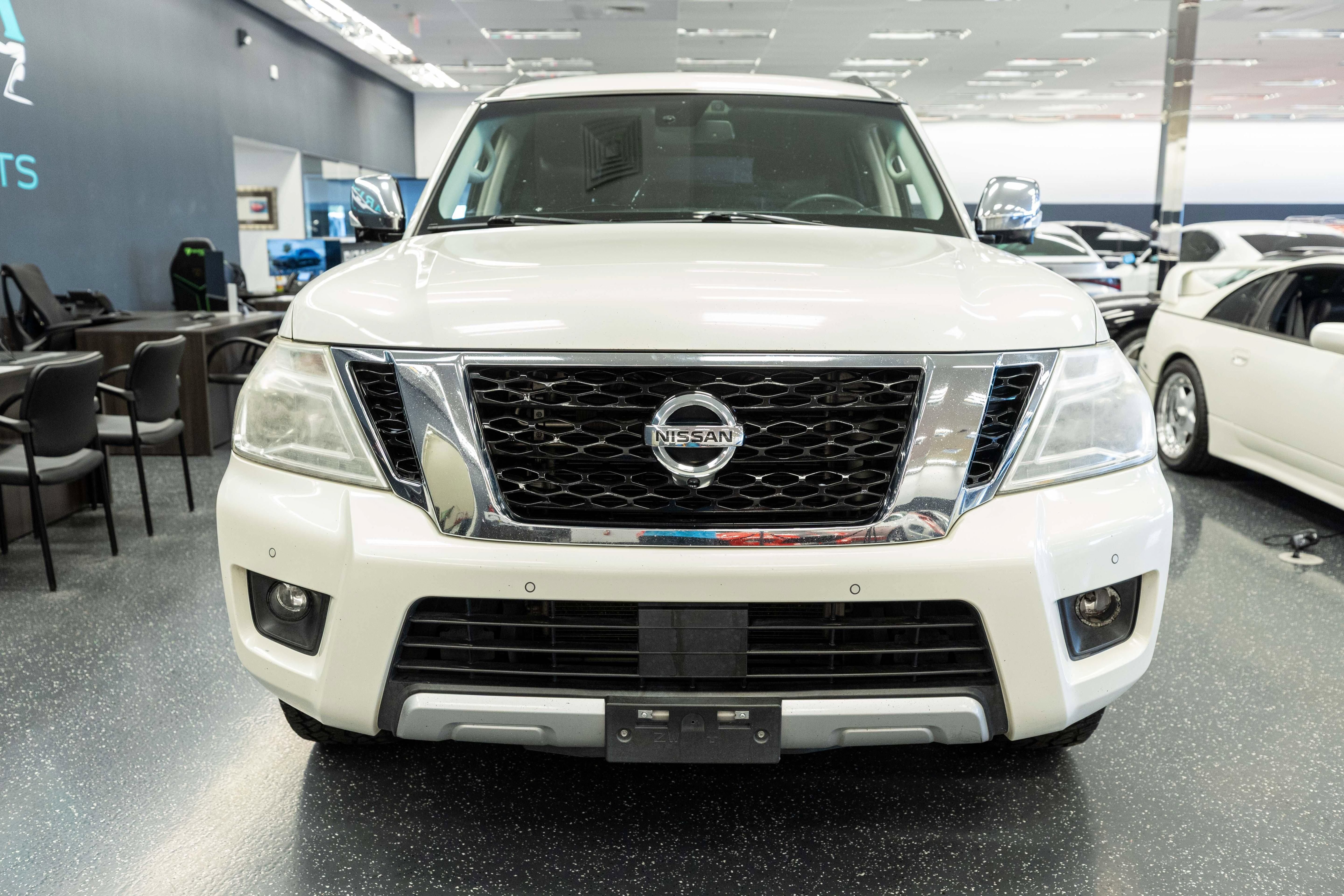 Used 2017 Nissan Armada Platinum w/ Captain Seat Package RWD image 2