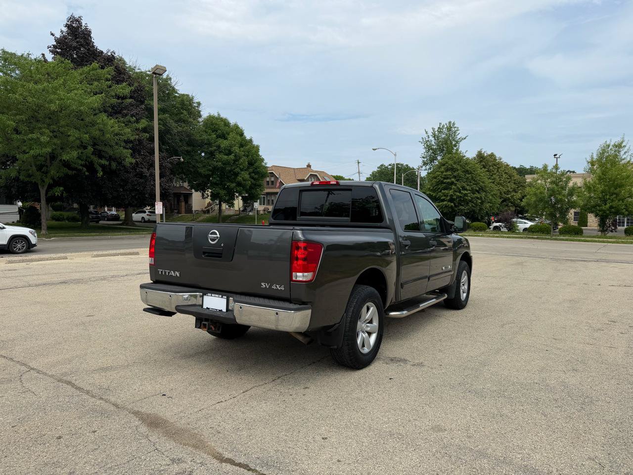 Used 2011 Nissan Titan SV w/ SV Premium Utility Pkg AWD/4WD image 7