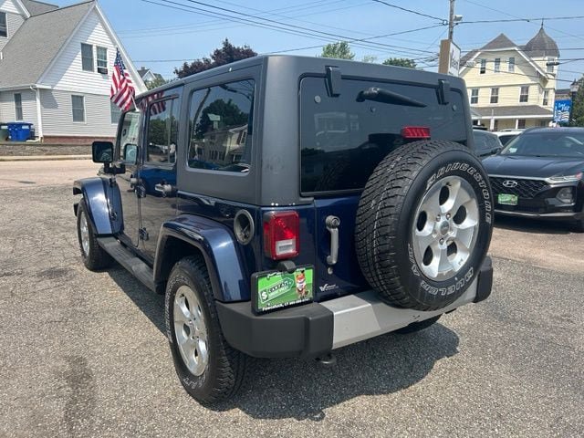Used 2013 Jeep Wrangler Unlimited Sahara w/ Dual Top Group AWD/4WD image 11