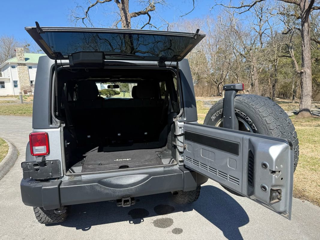 Used 2014 Jeep Wrangler Unlimited Sport w/ Dual Top Group AWD/4WD image 28
