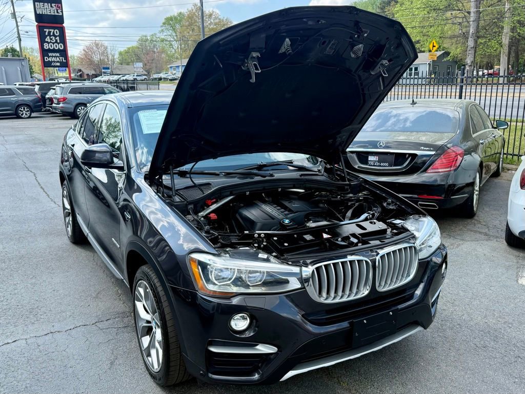 Used 2016 BMW X4 xDrive35i AWD/4WD image 4