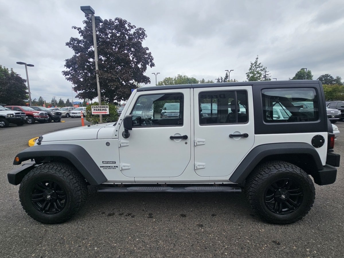 Used 2013 Jeep Wrangler Unlimited Sport