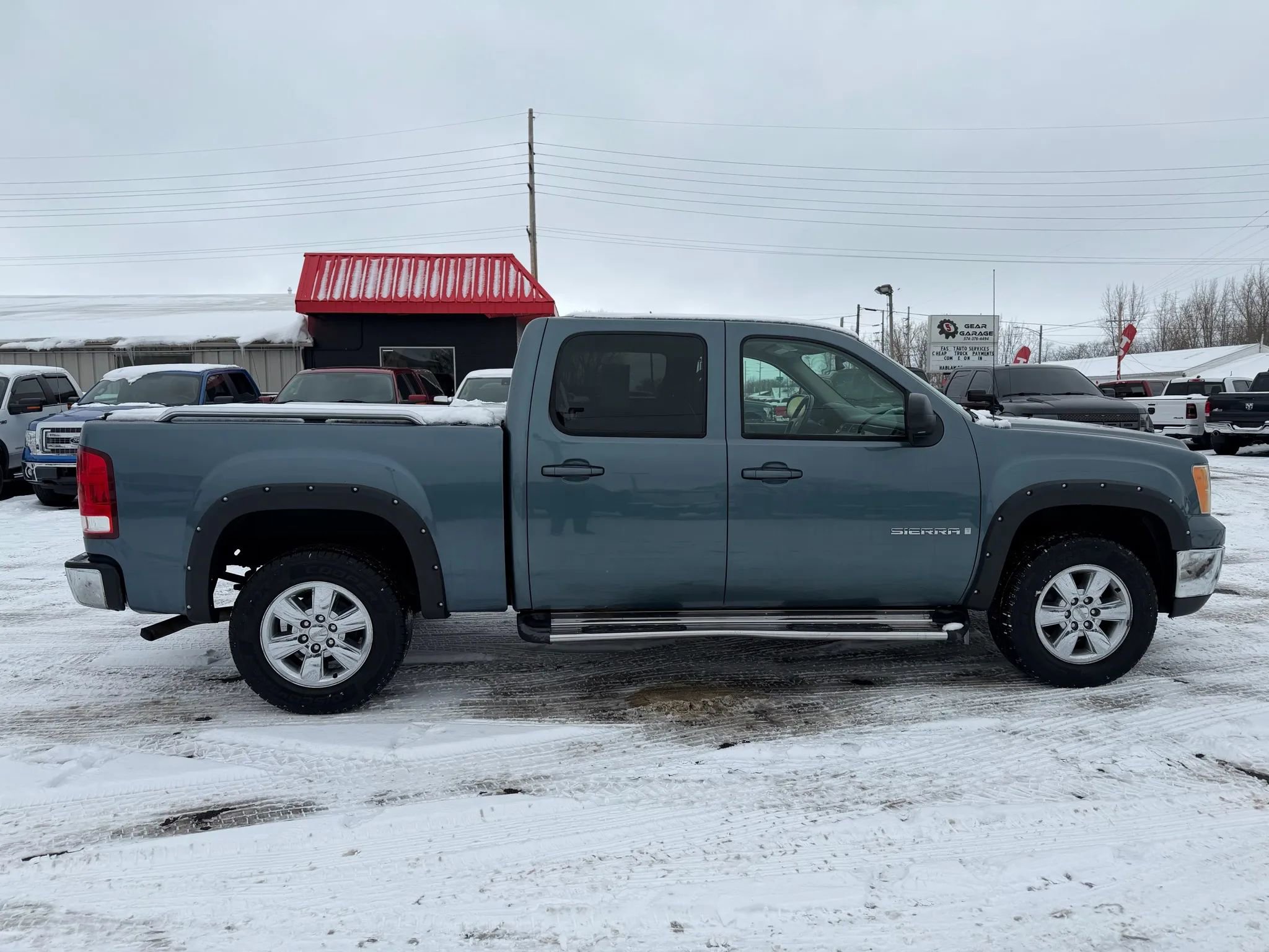 Used 2009 GMC Sierra 1500 SLT w/ Suspension Package, Off-Road image 4
