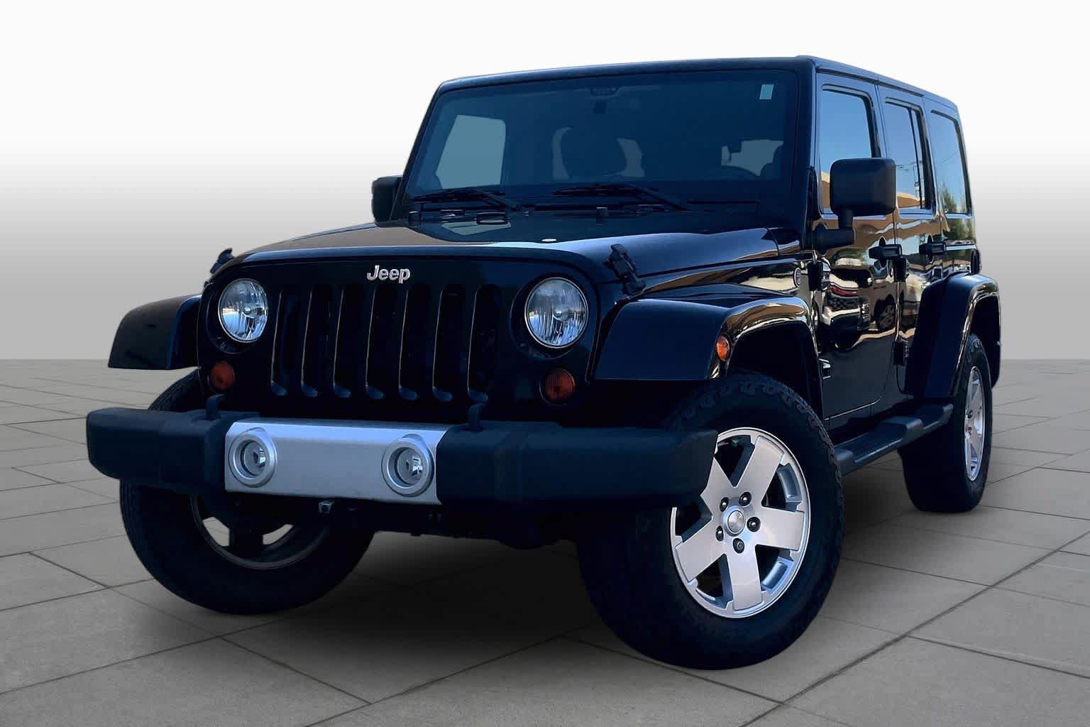 Used 2012 Jeep Wrangler Unlimited Sahara w/ Connectivity Group AWD/4WD image 1