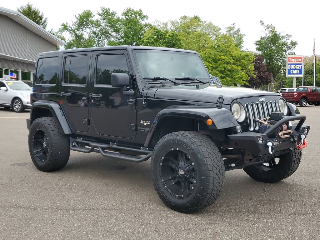 Used 2016 Jeep Wrangler Unlimited Sahara AWD/4WD video 2