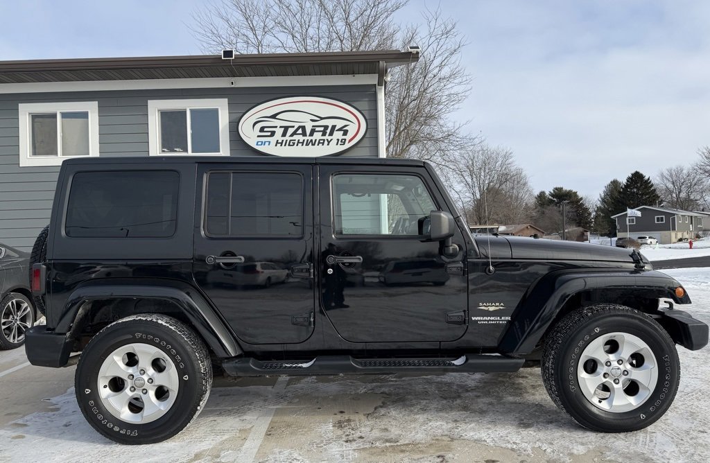 Used 2013 Jeep Wrangler Unlimited Sahara w/ Dual Top Group image 1