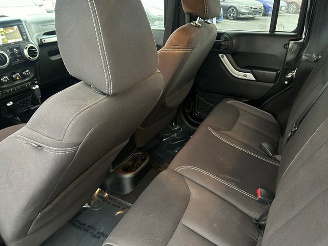 Used 2014 Jeep Wrangler Unlimited Sahara w/ Dual Top Group AWD/4WD image 29
