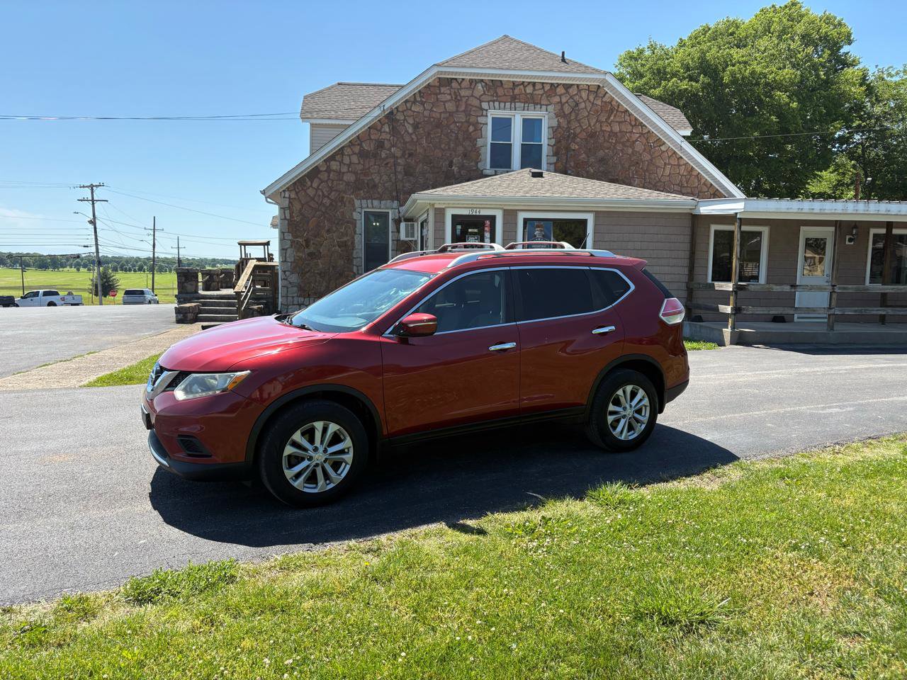 Used 2015 Nissan Rogue SV AWD/4WD image 1