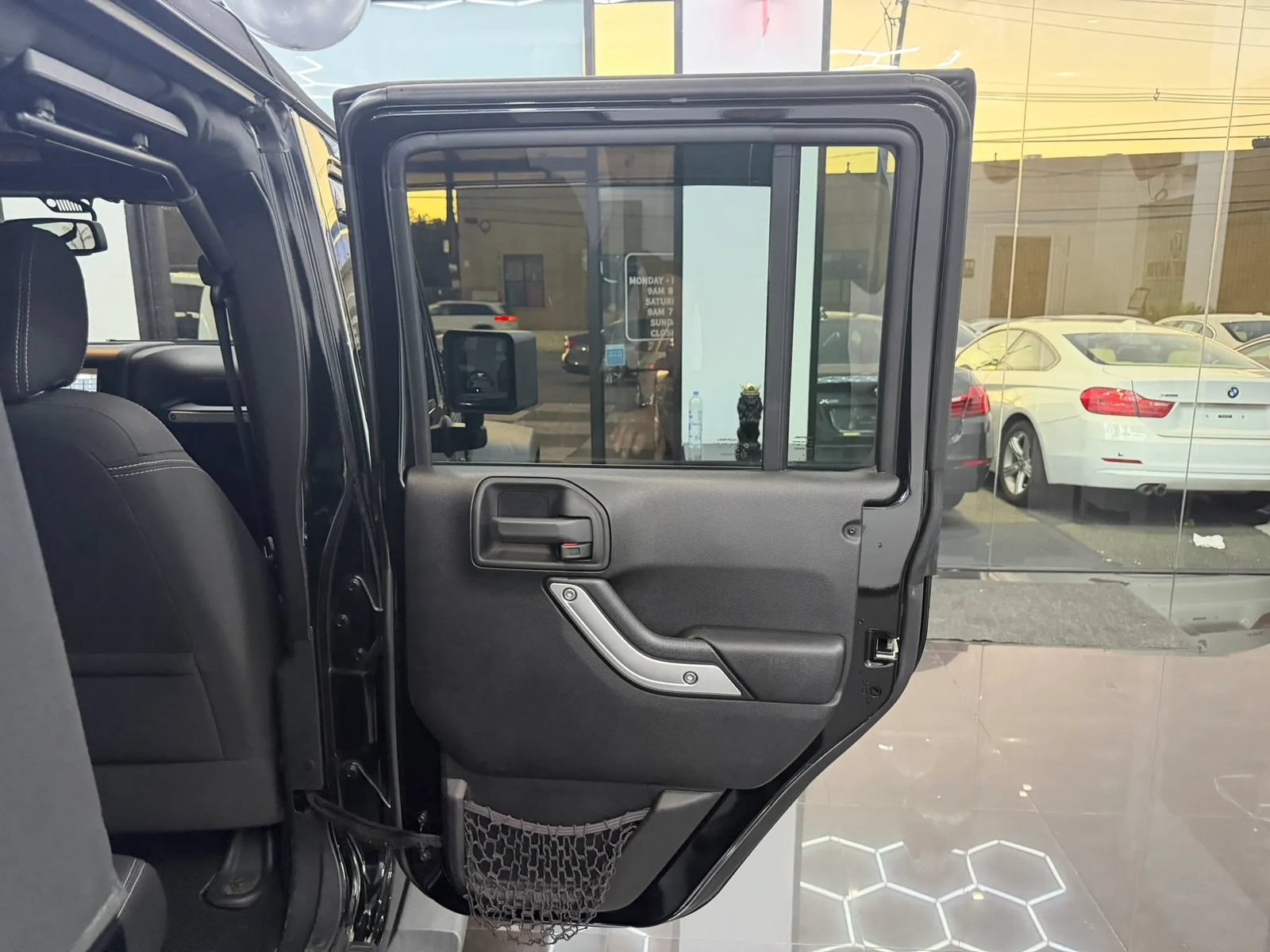 Used 2016 Jeep Wrangler Unlimited Rubicon w/ Dual Top Group AWD/4WD image 12