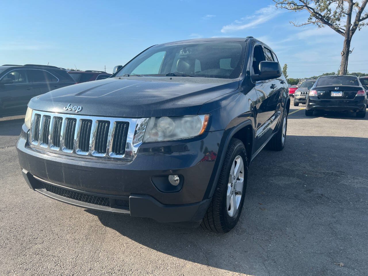 Used 2012 Jeep Grand Cherokee Laredo AWD/4WD image 1