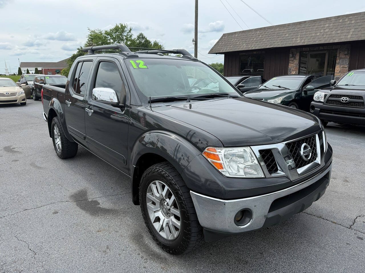 Used 2012 Nissan Frontier SL AWD/4WD image 2