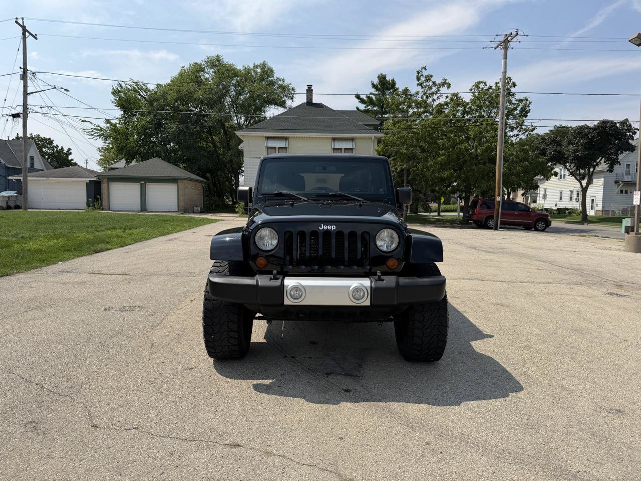 Used 2012 Jeep Wrangler Unlimited Sahara w/ Dual Top Group AWD/4WD image 2